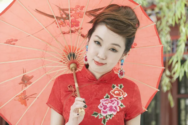 Woman in Qipao with Umbrella — Stock Photo, Image