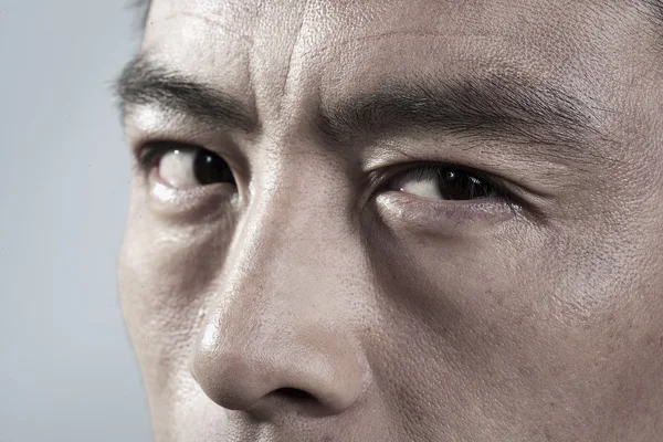 Extreme Close up on angry mans face — Stock Photo, Image