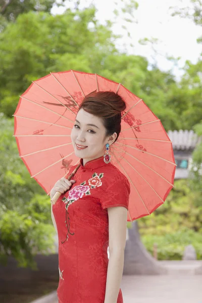 Woman in Qipao with Umbrella — Stock Photo, Image