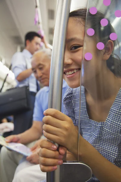 Granddaughter looking through the glass — Stock Photo, Image