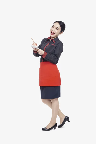 Young waitress taking an order — Stock Photo, Image