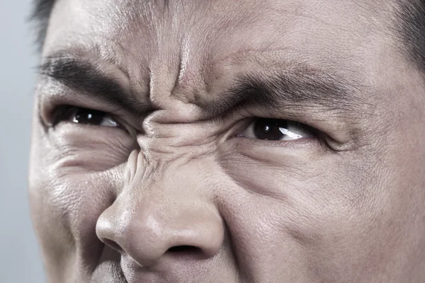 Extremo Close-up em cara de homem com raiva — Fotografia de Stock