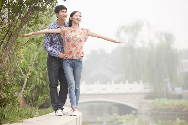 Boyfriend and Girlfriend by a Canal — Stock Photo, Image