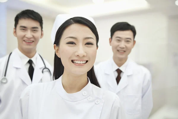 Two Doctors and Nurse Stock Photo