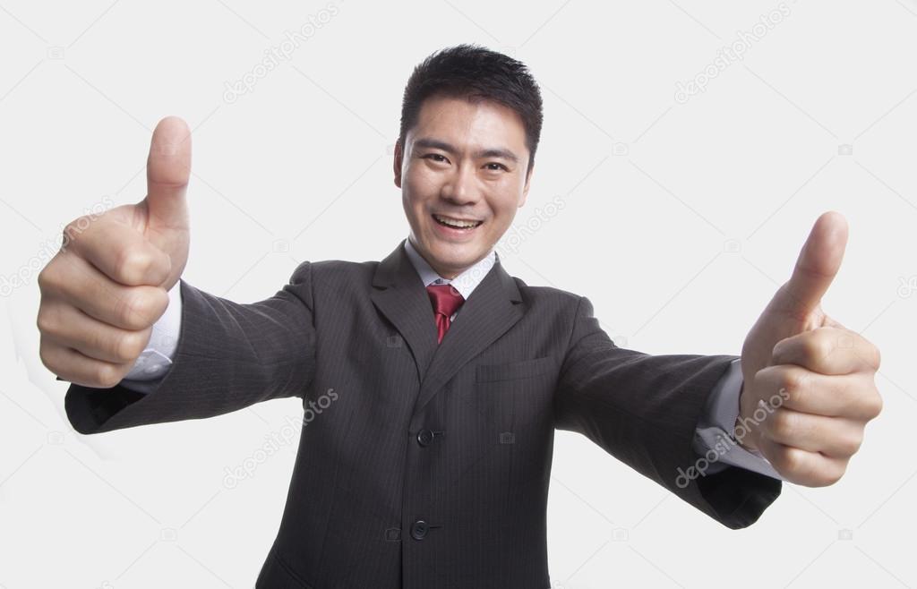 Businessman Giving Thumbs-Up