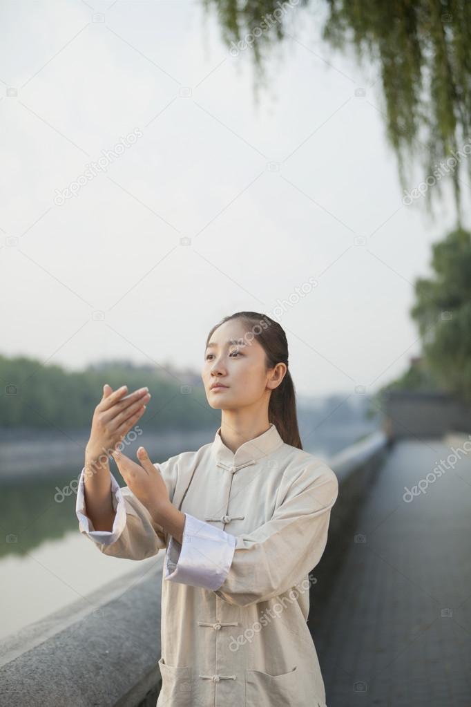 Woman Practicing Tai Ji