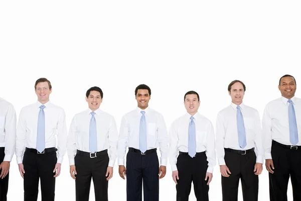 Similar looking businessmen in row — Stock Photo, Image