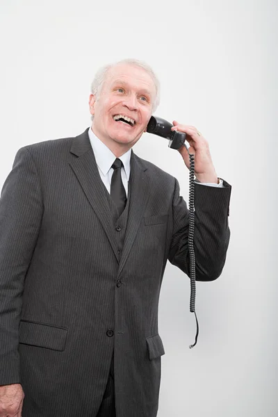 Affärsman med en trasig telefon — Stockfoto