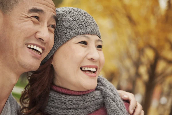 Mature Couple Embracing in Park — Stock Photo, Image