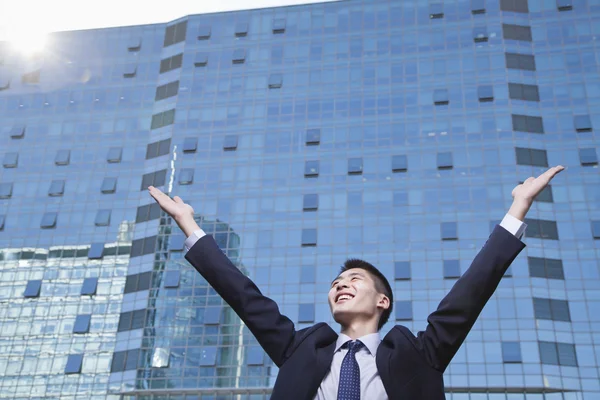 Businessman with arms raised — Stock Photo, Image