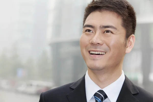 Businessman Smiling and Looking Away — Stock Photo, Image