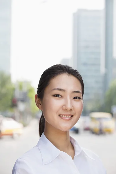 Businesswoman smiling outside — Stock Photo, Image