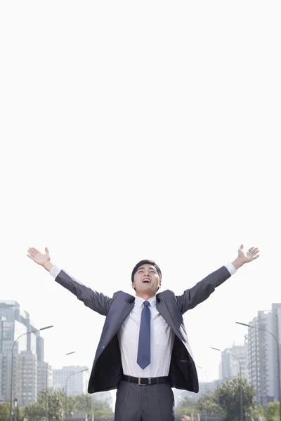 Businessman with Arms Raised — Stock Photo, Image