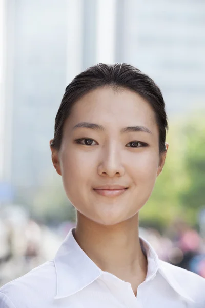 Businesswoman smiling outside — Stock Photo, Image