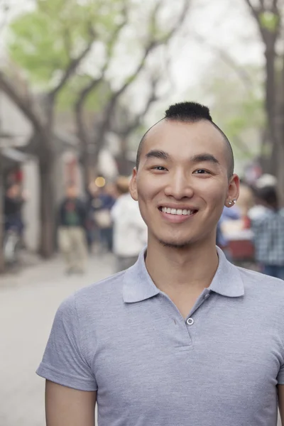 Young Man with Mohawk haircut smiling — Stock Photo, Image