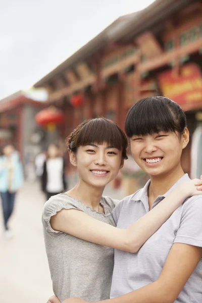 Two friends embracing — Stock Photo, Image