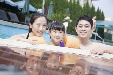 Family in the pool clipart