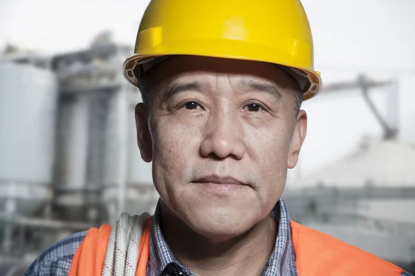 Proud worker outside of a factory — Stock Photo, Image