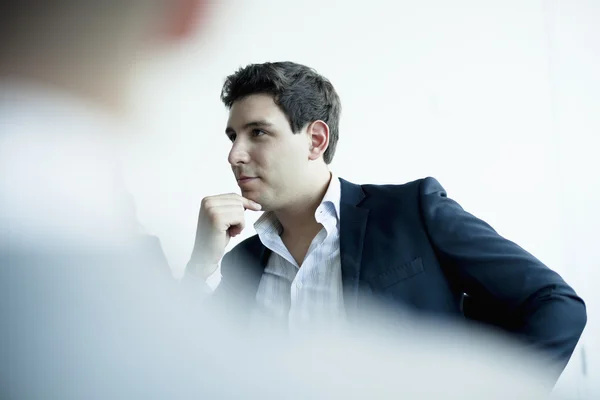 Businessman listening in a business meeting