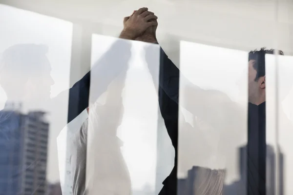 Business people cheering with hands together — Stock Photo, Image