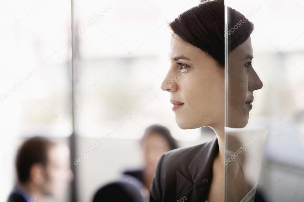 Businesswoman with coworkers