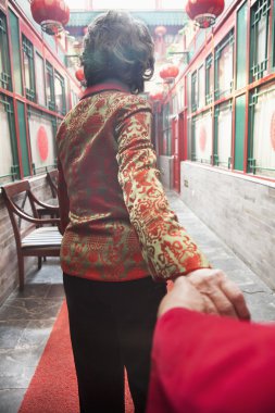 Senior couple holding hands clipart