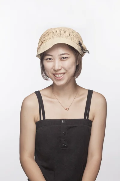 Smiling woman with hat — Stock Photo, Image