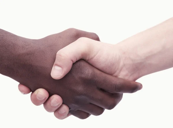 Twee jonge mannen schudden elkaar de hand — Stockfoto