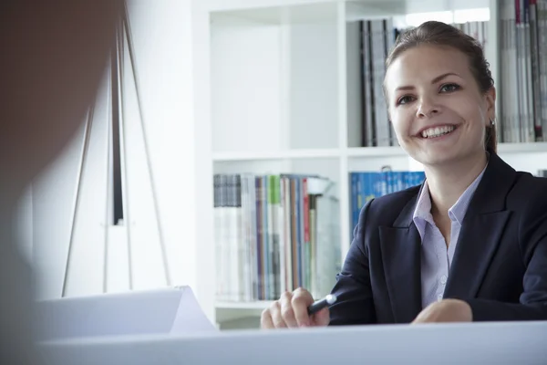 Businesswoman during a business meeting — Stock Photo, Image