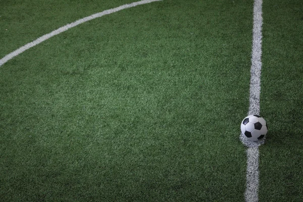 Fotbalový míč na řádku — Stockfoto