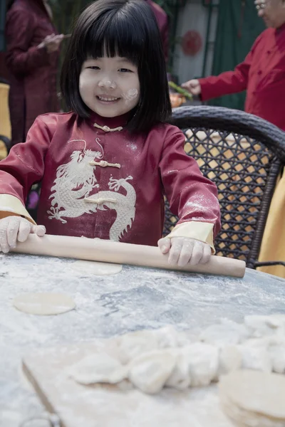 Little girl making dumplings — Stock Photo, Image