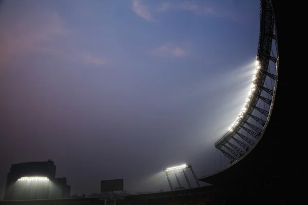 Stadium floodlights at night time — Stock Photo, Image