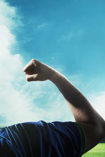 Piłka nożna gracz zginanie biceps — Zdjęcie stockowe