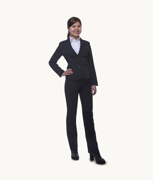 Businesswoman with hand on hip — Stock Photo, Image