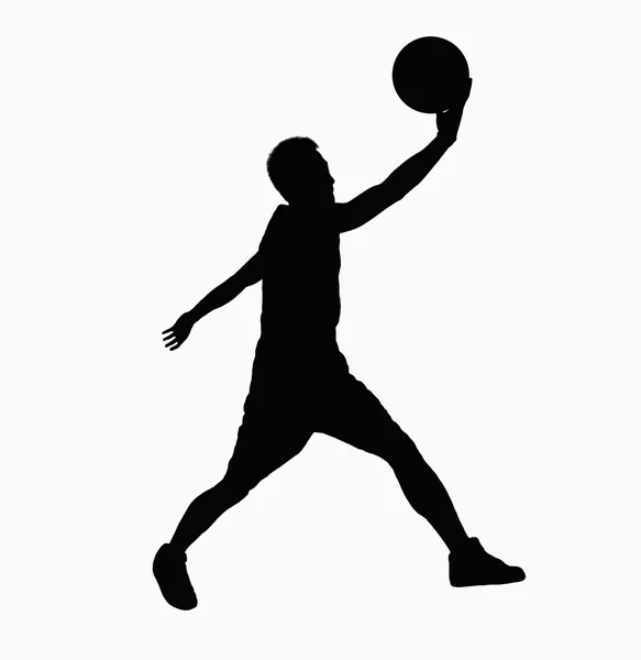 Silhouet van basketbalspeler — Stockfoto