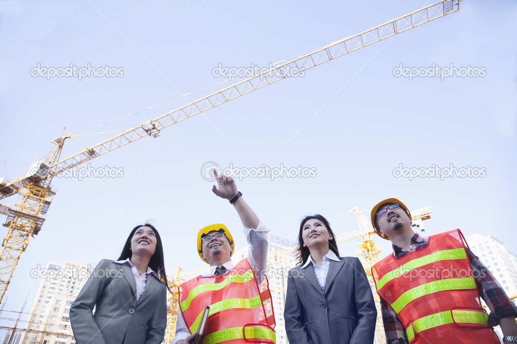 Architects and businesswomen at a construction site