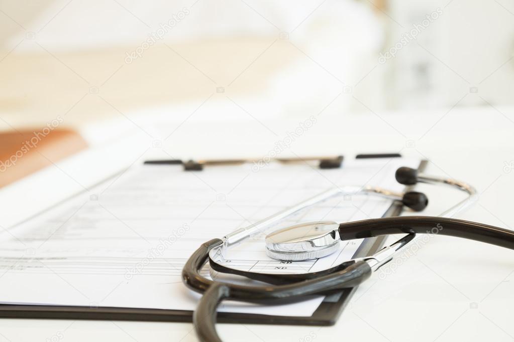 Stethoscope and medical chart