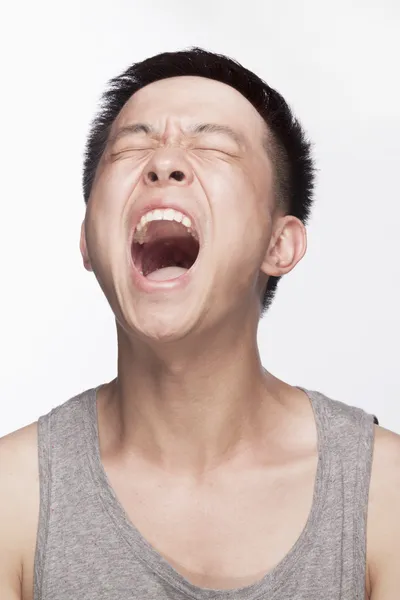 Young man screaming — Stock Photo, Image