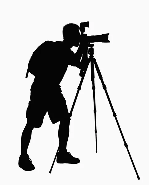 Silhueta de homem tirando fotos com câmera — Fotografia de Stock