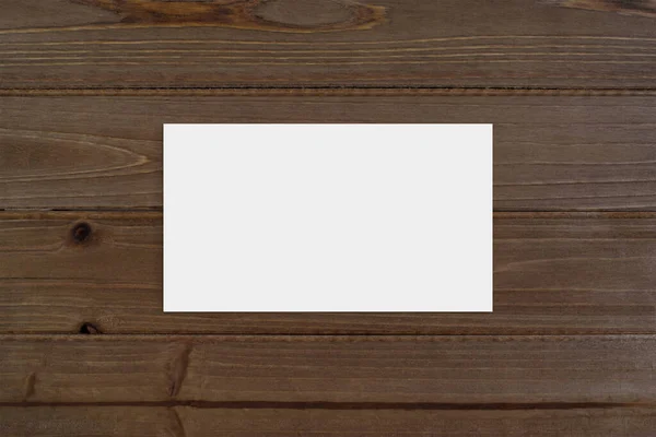 Top View White Business Card Atop Modern Brown Wood Background — Foto de Stock