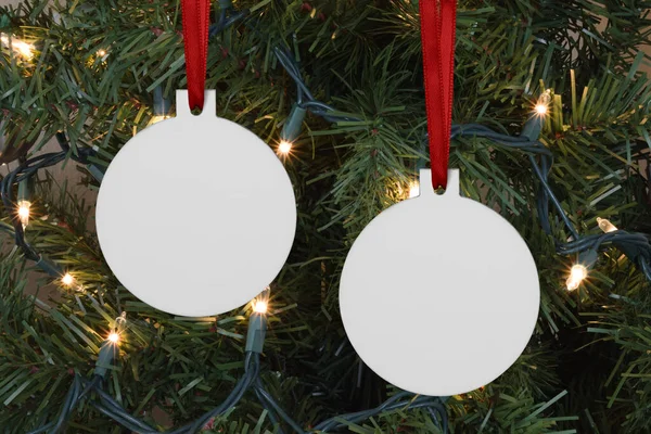 Closeup Two Ball Shaped Christmas Ornaments Hanging Merrily Lit Christmas — Zdjęcie stockowe