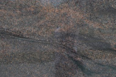 Closeup of marble pattern stone wall.