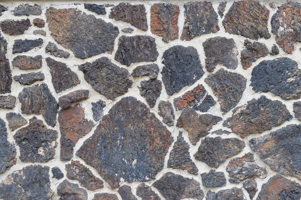 Closeup of modern rock wall.