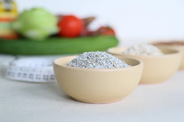 Barley cereal in the clay dish — Stock Photo, Image