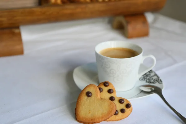 Biscuits and a cup of coffee — Stock Photo, Image