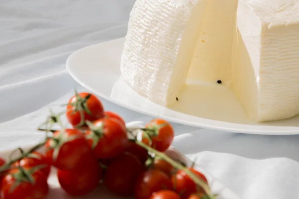 Fresh sicilian cheese with black pepper — Stock Photo, Image