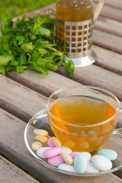 Green tea with nuts — Stock Photo, Image