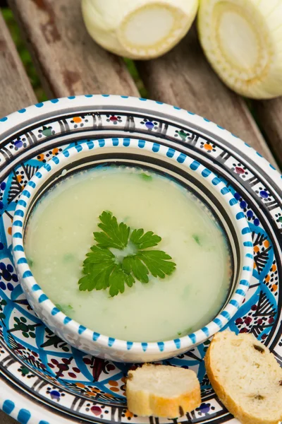 Fennel cream soup in the traditional tunisian plate — Stock Photo, Image