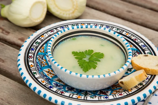 Fennel cream soup in the traditional tunisian plate — Stock Photo, Image