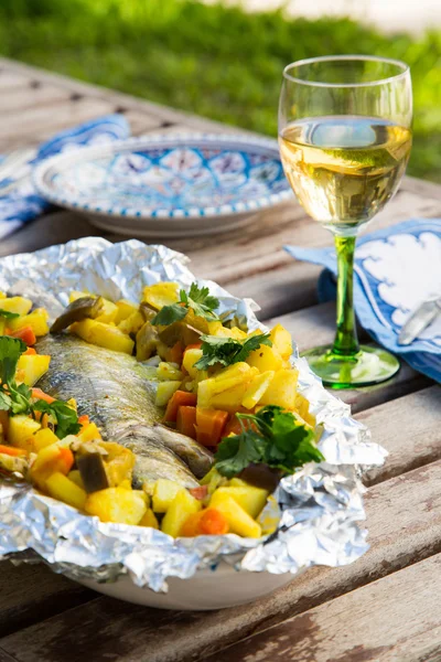 Baked sea bass with vegetables — Stock Photo, Image